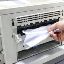 Technicians Removing Paper Stuck, Paper Jam In Printer At Office