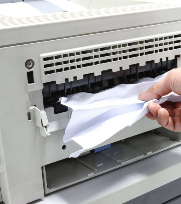 Technicians Removing Paper Stuck, Paper Jam In Printer At Office